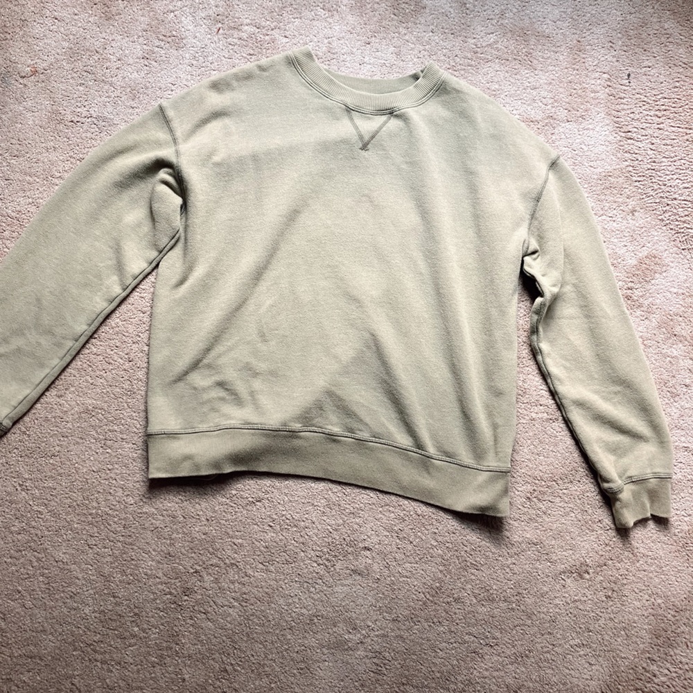 Light, green sweater